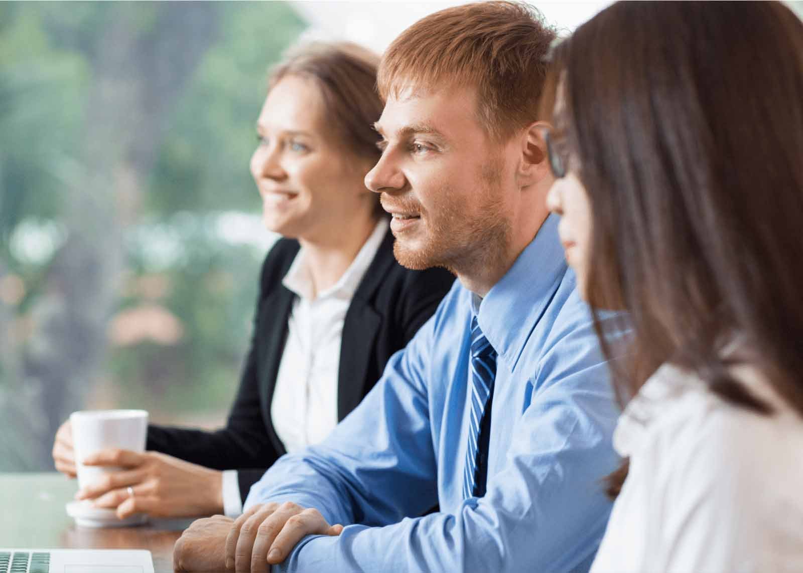 Three customers asking questions and learning more about Accruent's software.