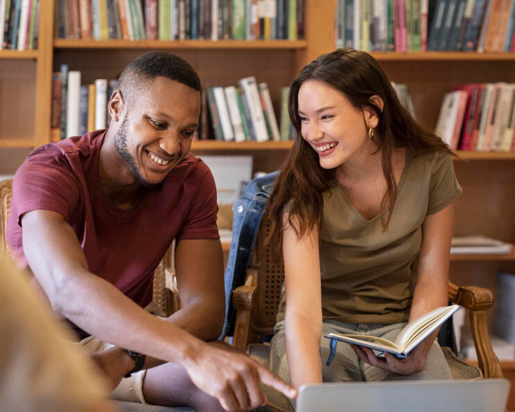 Two students in a well-organized university space, highlighting space planning and management software (5)