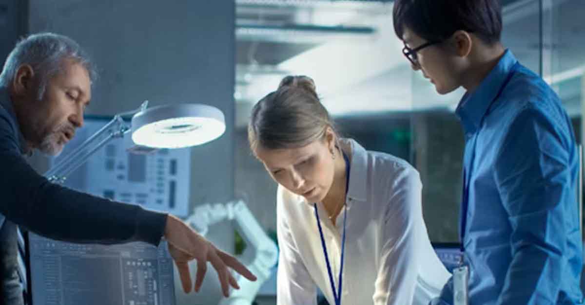 Team of professionals collaborating on a project in an office