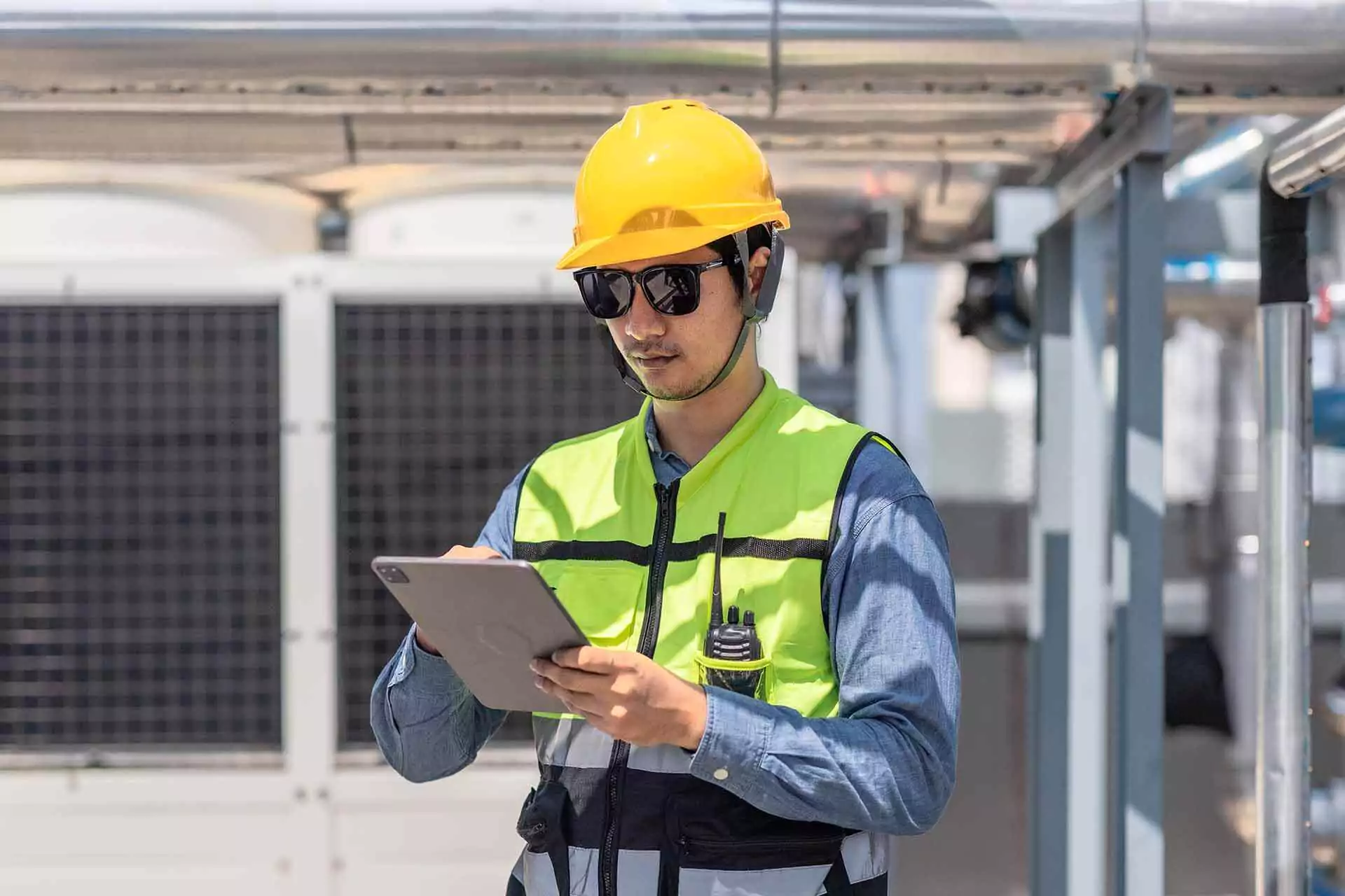 Construction worker managing work on a table in utilizing Vx Sustain