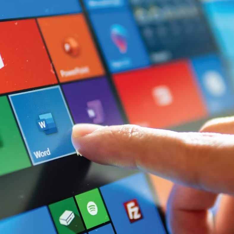 An image of a finger selecting an app on a tablet.